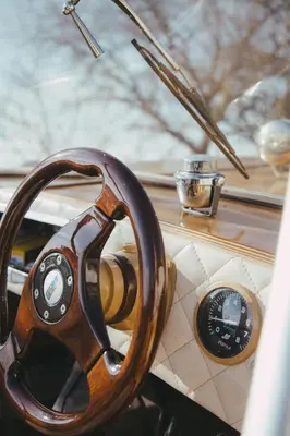 a wooden steering wheel sitting on top of a dashboard at Apedeceo Belesar Villa, Ribeira Sacra, Galicia in Chantada