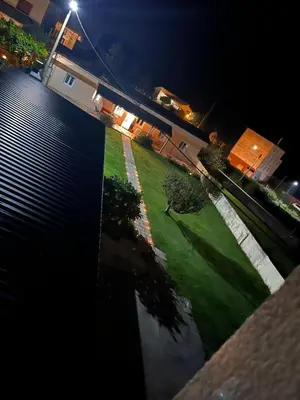 an aerial view of a yard at night at Viviendas uso turístico REME I in Foz