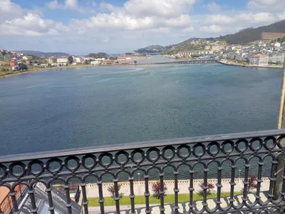 a view of a body of water from a bridge at MARINA SOL VIVEIRO in Viveiro
