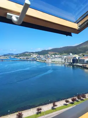 a view of the water from a window at MARINA SOL VIVEIRO in Viveiro