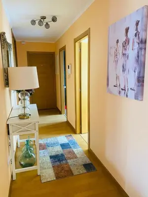 a living room with a lamp and a table with a lamp at Suite Azucarera in Iria