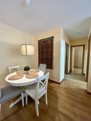 a dining room with a white table and chairs at Centro de Miño - Pumariega in Miño